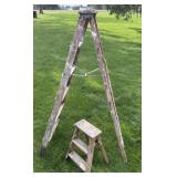 Two vintage wooden folding ladders