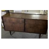Mid-century dresser shows some signs of where