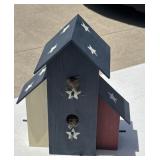 Decorative red, white and blue birdhouse