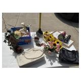 Candles, flashlight, purses, plunger, household