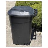 Plastic trashcan on wheels
