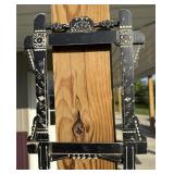 Antique black-and-white carved picture frame