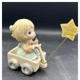 Precious moments, wishing you a world of peace