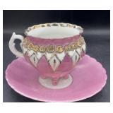 Antique teacup and saucer, saucer has chipping on