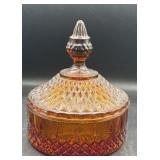 Amber glass candy dish with lead small spot of