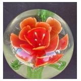 Glass paperweight with flower design
