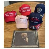 Several Donald Trump hats/picture