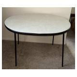 Fold up oval table