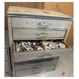 Two small wooden cabinets filled with