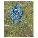 Two large outdoor extension cords