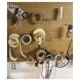 Large amount of misc tapes,clamps, glue plastic