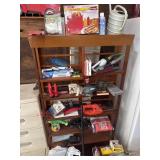 Wooden shelf, hotdog, toaster, tools, dog,