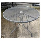 Outside metal round patio table