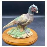 Large bird figurine