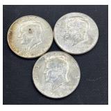 Three 1964 silver Kennedy half dollars