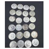 Twenty four Kennedy half dollars