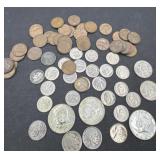 Variety of American coins with pennies half