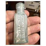 Old medicine show sample bottle Renne
