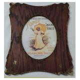 Antique wooden frame w Topsy Tobacco advertising