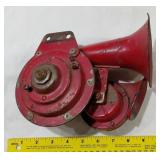 Antique red double horn automobile fire truck