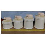 Set of 4 vintage pig cannisters