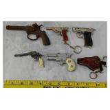 SIX miniature vintage toy cap guns