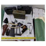Box of gun holsters targets cases & parts