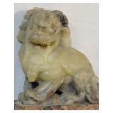 Carved natural stone feng shui foo dog / lion