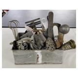Old tote w kitchen ware gadgets advertising more