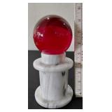 Huge 4 inch ruby glass orb on white marble stand