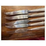 set of 5 knives marked STERLING silver