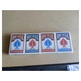 4 sealed packs of bicycle playing cards