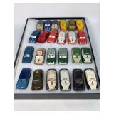 Argo tin cars lot of 24 police, taxi, USA, etc. Come with display case