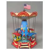 Josef Wagner 'Nürnberger Blechspielzeug' Tin Wind-Up Swing Carousel — Made in Brunn, Germany, © 2002, American Flag Topper