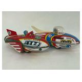 Set of Two Tin Lithograph Friction Toys, Rocket Racer and Torpedo Boat