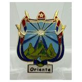 Lapel pin depicting the historical Coat of Arms of Oriente Province, Cuba