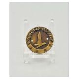 Eastern Air Lines 'Great Silver Fleet' Brass Falcon Disc Insignia (Mid-Century)