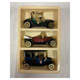 Three Die-Cast Vintage Car Models