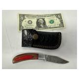 Folding Knife with Damascus Blade and Leather