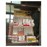 NAPA Balkamp muffler clamp rack and contents