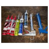Caulk guns