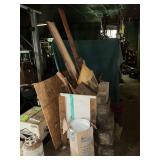 Large box of assorted lumber, roll of trim coil