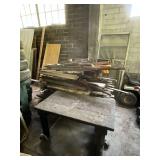 Heavy wooden table with cast rollers, wooden windows, counter top