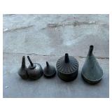 Vintage metal funnels.
