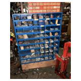 Blue metal hardware bin with contents