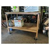 Metal framed workbench on casters