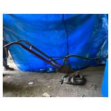 Horse drawn single bottom plow with horse collar and hames