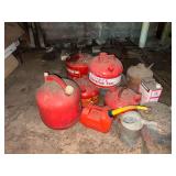 Assorted gas cans and floor jack