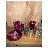 2 colored aluminum pitchers