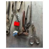 Assortment of pliers and wrenches
